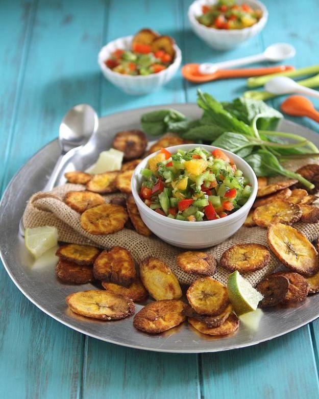 Baked plantain chips with a kiwi avocado and pepper salsa in a bowl, a gluten free paleo appetizer idea