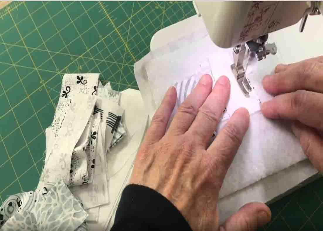 Sewing the layers for the quilted coasters