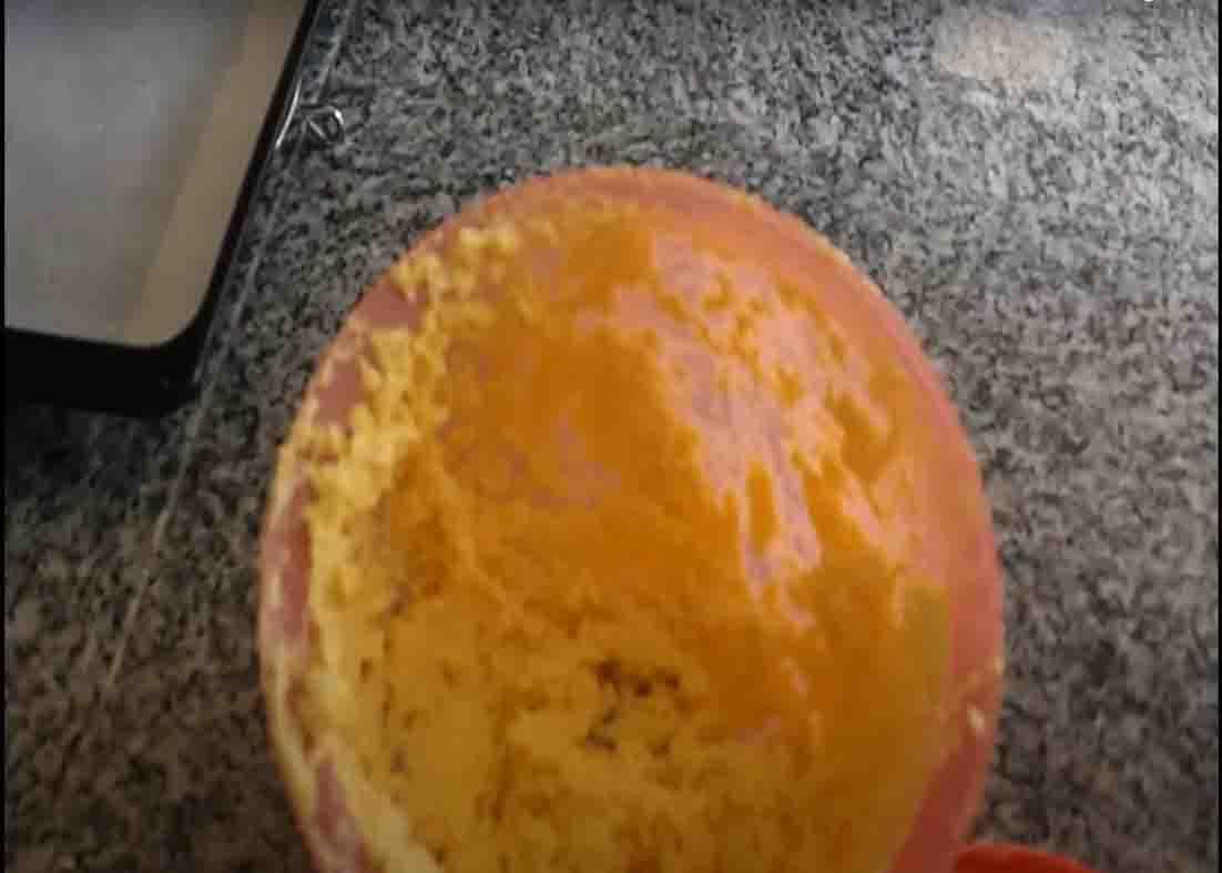 Mixing the butter and sugar to make the biscuits