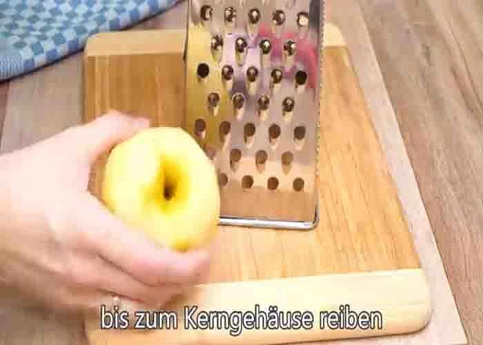 Grating the apples for the pancake recipe