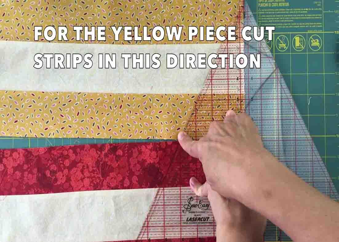 Cutting the strips to make the pieces needed for the tumbling blocks quilt
