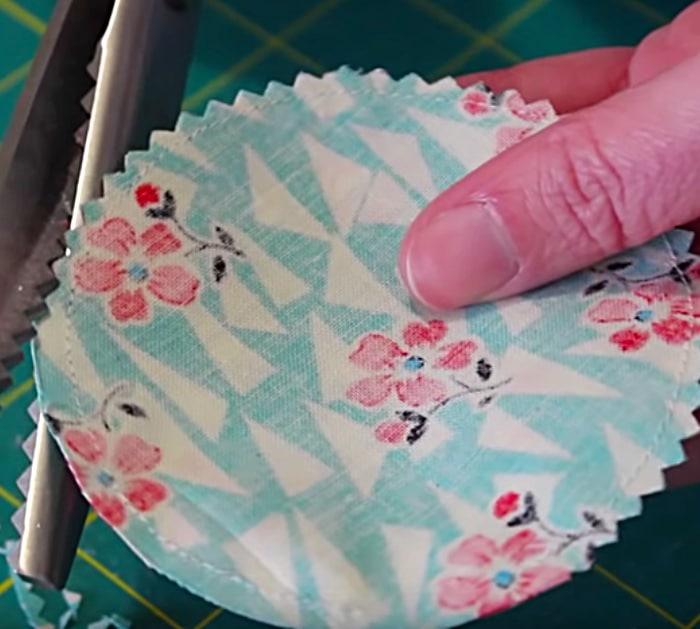 Learn to sew a DIY Petal Pincushion from fabric scraps and poly stuffing