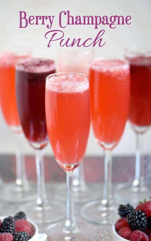 Typeset graphic reading Berry Champagne Punch over champagne flutes of pink punch with fresh berries beside them