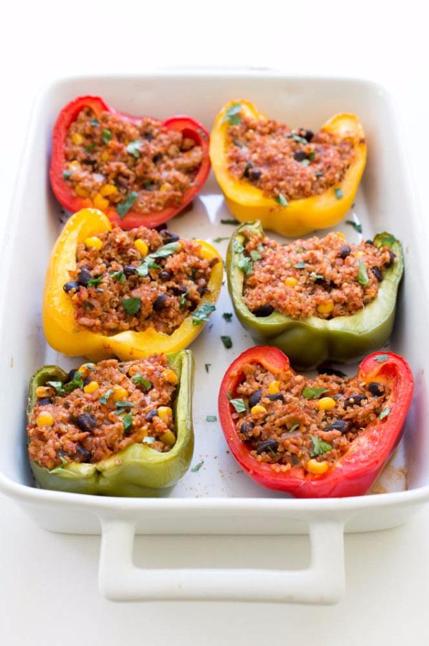 Mexican quinoa and turkey stuffed bell peppers baked until tender and topped with cilantro and lime ready to serve at home