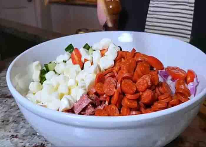 Tossing the party pasta salad