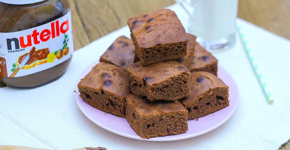 Three ingredient Nutella brownies cut into fudgy squares, an easy chocolate hazelnut snack recipe idea for a party tray