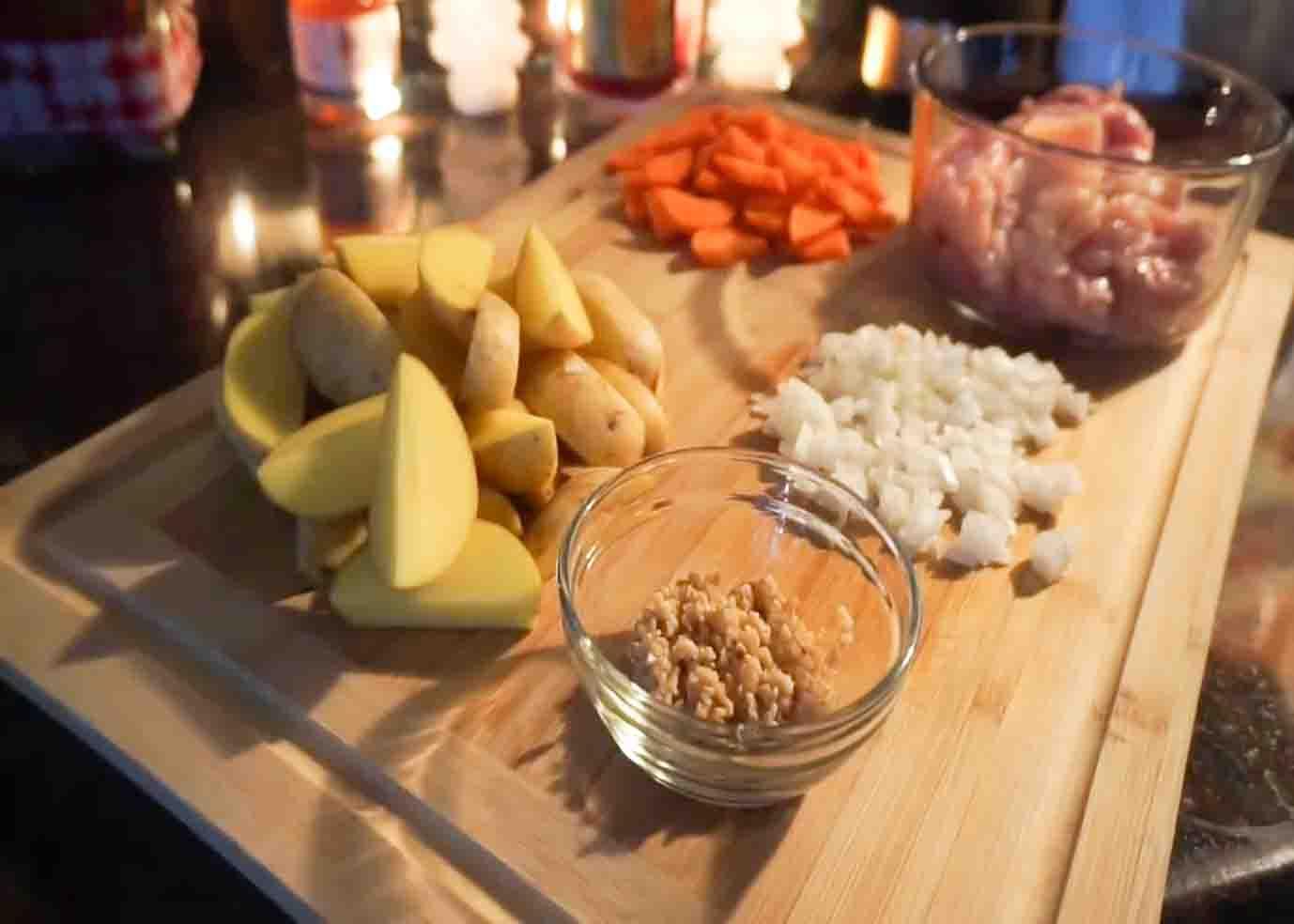 Chopping all the vegetables for the chicken stew