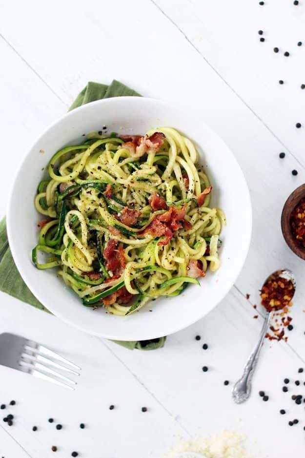 Zucchini noodle bacon cacio e pepe with spiralized zucchini, crisp bacon and plenty of cracked black pepper