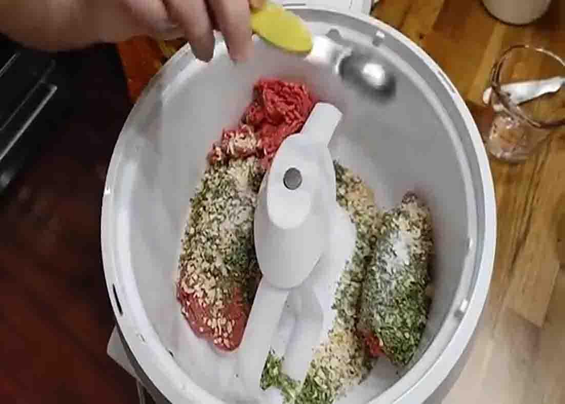 Mixing all the ingredients for the southern meatballs