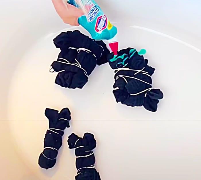 Pour Gel Bleach On Black Clothes For Tie Dye