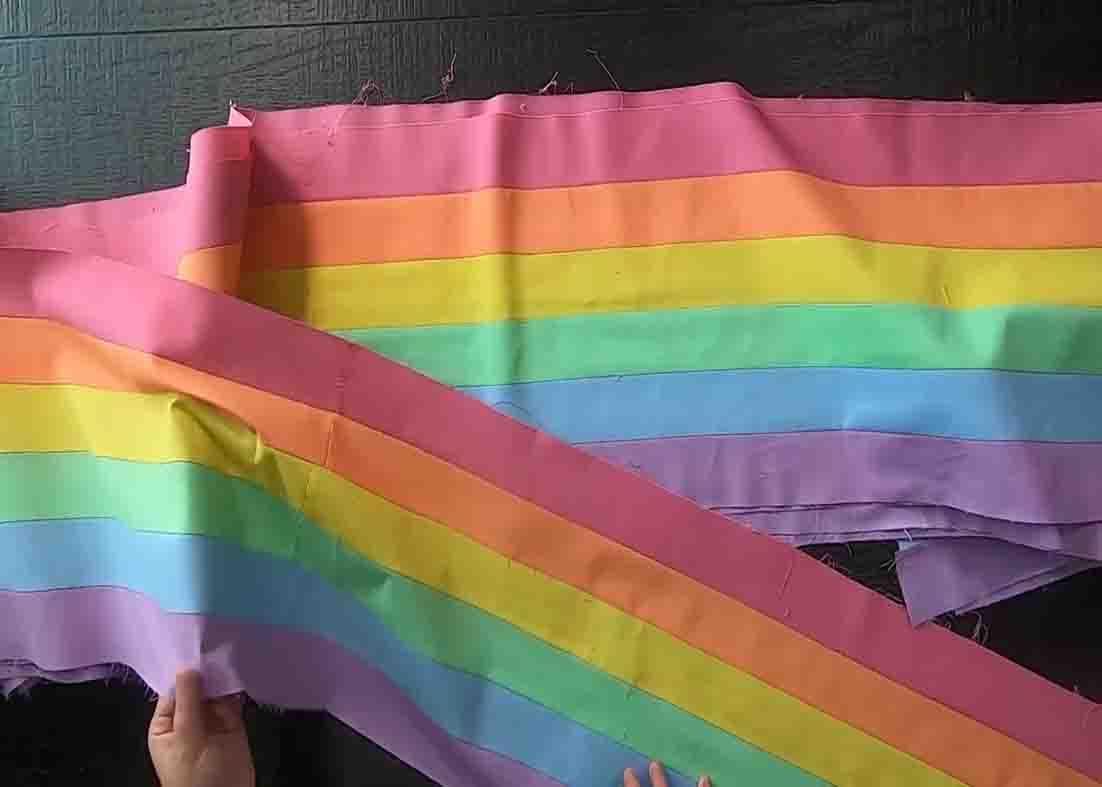 Stitching the rainbow strips to make the rainbow road quilt pattern
