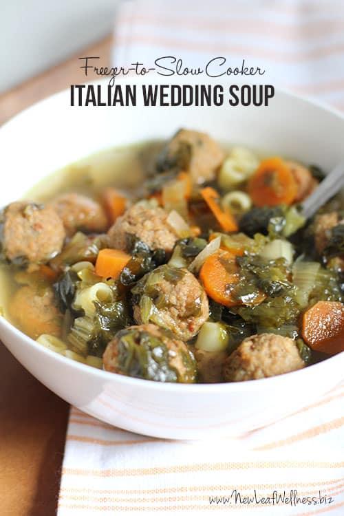 Freezer to slow cooker Italian wedding soup with small meatballs and greens in broth, a make ahead meal