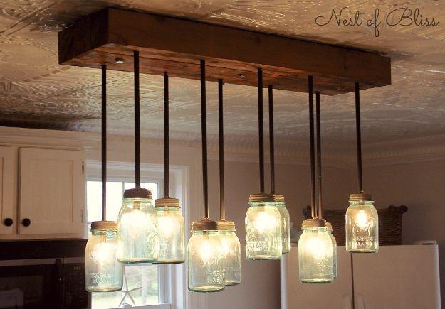 Mason Jar Chandelier, cheap to pull off with dollar store finds and proof a small change makes a real difference