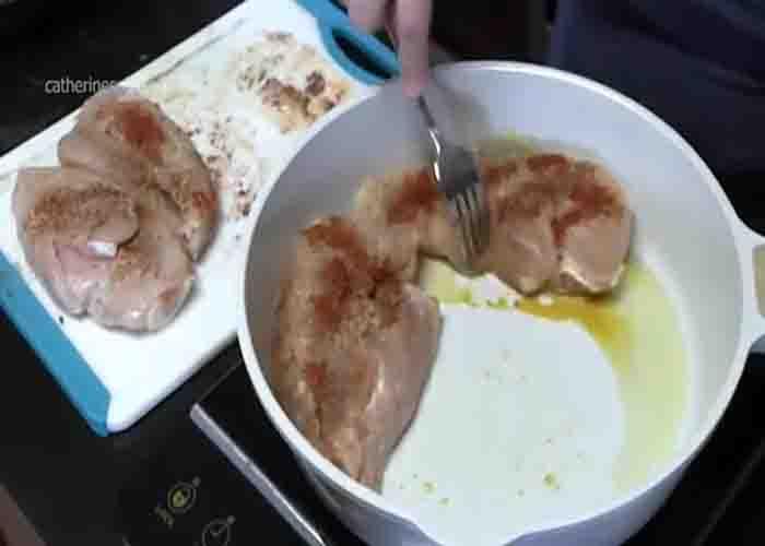 Searing the chicken breasts before slow cooking