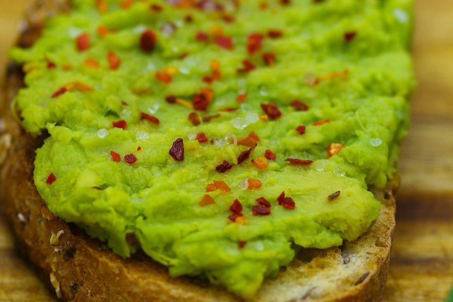 Avocado toast with olive oil, lemon juice, red pepper flakes and flaky salt