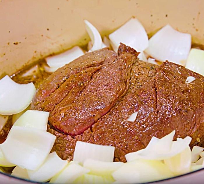 Learn to make a classic Sunday Pot Roast In A Cast Iron Dutch Oven