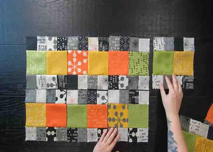 Laying the quilt blocks down to make the quilted table runner