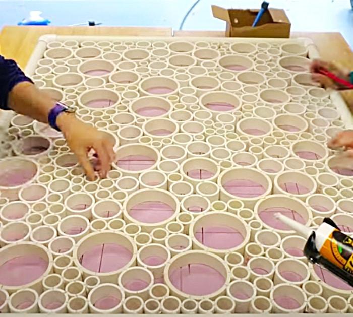 Glue PVC rings together to make a privacy screen