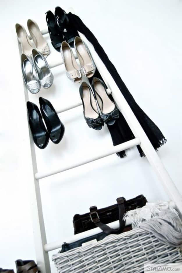 Reuse An Old Ladder As Shoe Rack, cheap to pull off with dollar store finds and a detail guests always ask about