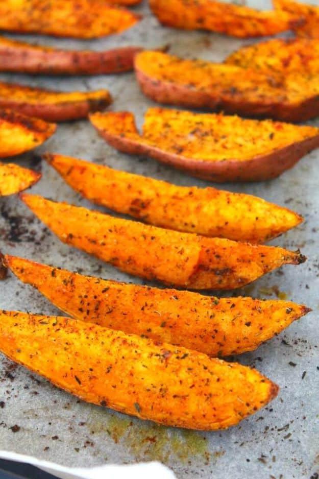 Sweet Potato Recipes - Spiced herb Roasted Sweet Potato Wedges - Easy Recipe Ideas for Sweet Potatoes in the Crockpot, Casserole Dishes, Baked, Mashed, Candied and Roastedd - Healt