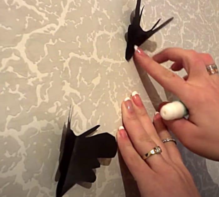 Cut paper butterflies to stick on the wall