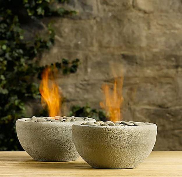 Restoration Hardware DIY river rock fire bowls, one of the best designer knockoff ideas on this list and worth a look