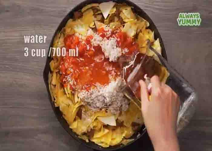 Cooking the ground beef and cabbage stew