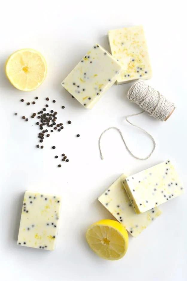 Solid lemon peppercorn sugar scrub bars stacked on a dish, a handmade bath and body product that sells well