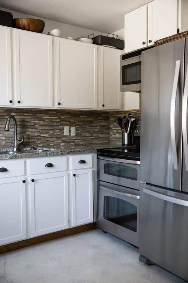 Paint Oak Cabinets White, a simple change that transforms a dated kitchen and an easy cabinet upgrade with basic tools