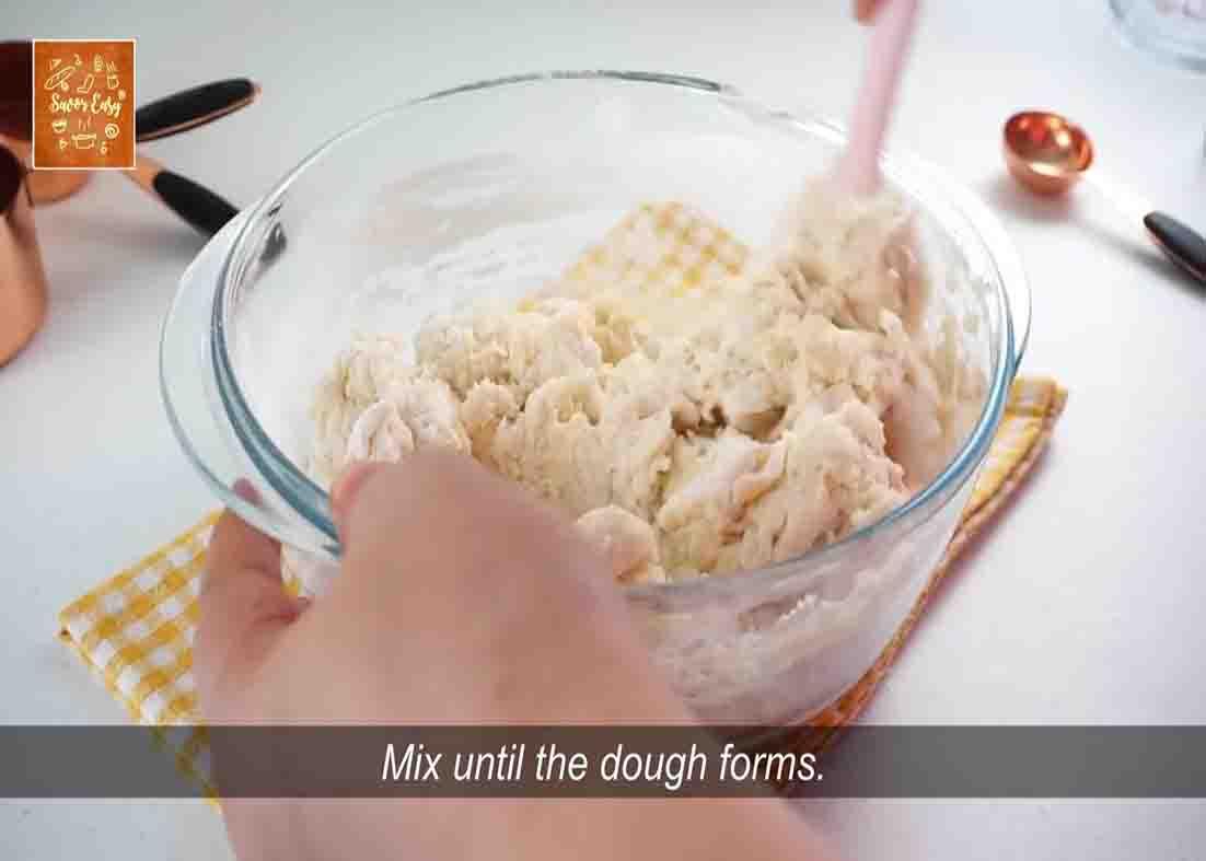 Mixing the ingredients to make the twisted doughnuts