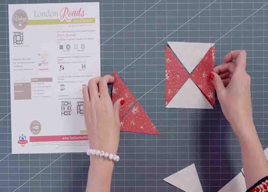Cutting the fabric tp make the half-square triangles