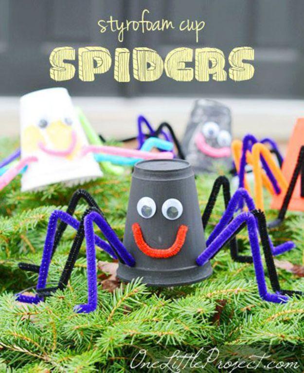 Pin graphic reading Styrofoam Cup Spiders, a black cup spider with purple and black pipe cleaner legs on evergreen