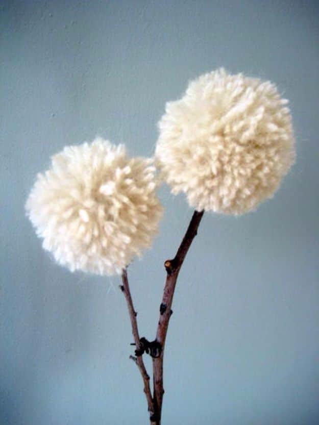 DIY Yarn and Twig Dandelions, an easy yarn craft for beginners and a budget friendly way to use leftover yarn