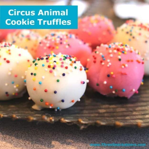 Circus animal cookie truffles, pink and white candy coated balls covered in rainbow nonpareil sprinkles