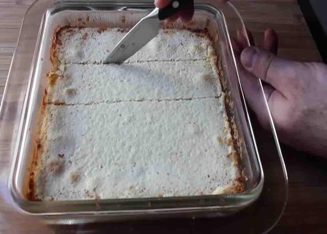 Slicing the lemon meringue bars into pieces