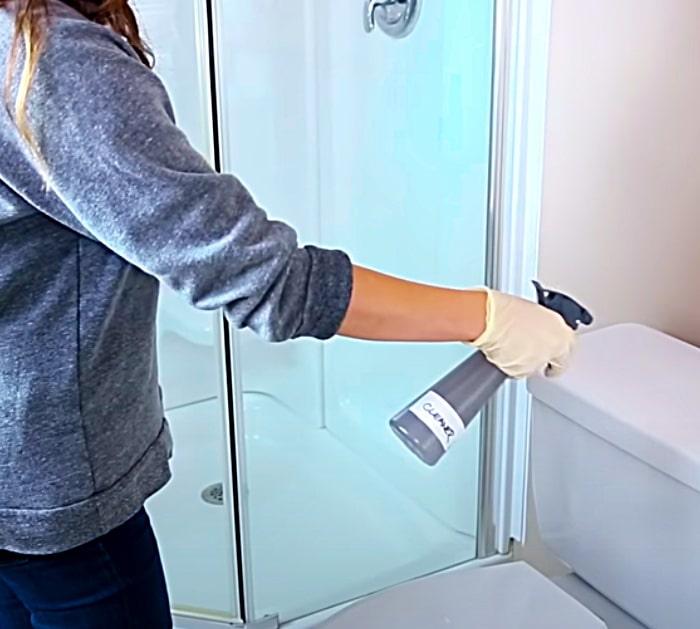 Spray Toilet With Disinfectant To Pre Treat Before A Cleaning