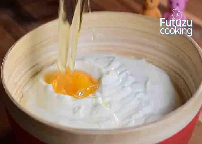 Mixing all the ingredients for the yogurt dessert casserole