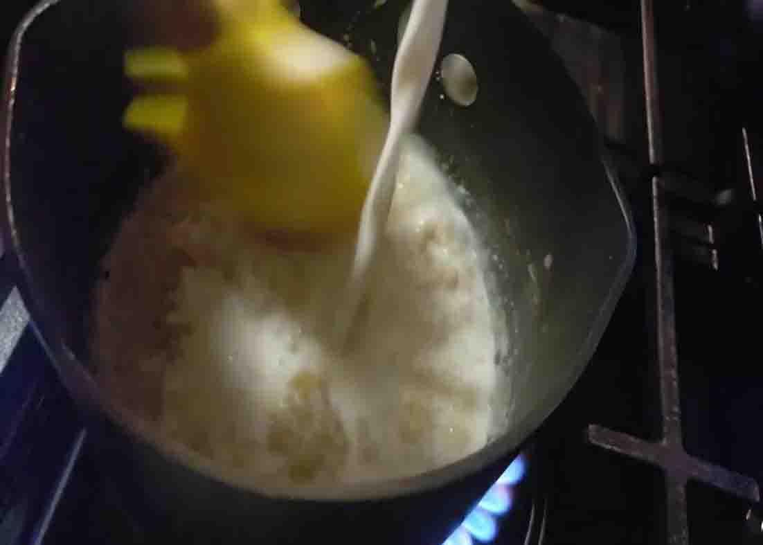 Making the sauce for the cheesy broccoli recipe