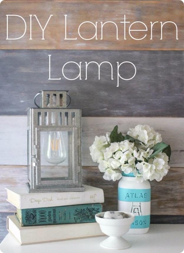 DIY lantern lamp, a galvanized candle lantern wired with an Edison bulb beside white hydrangeas in a painted jar