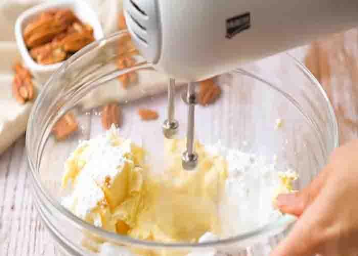 Making the batter for the pecan butterballs