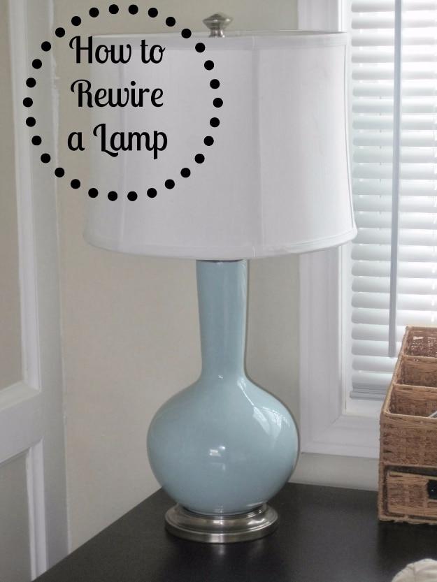 DIY home repair: a pale blue ceramic table lamp with a white shade by a window, under a typeset How to Rewire a Lamp title