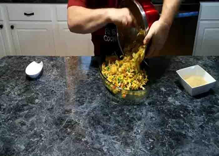 Assembling the chicken noodle casserole