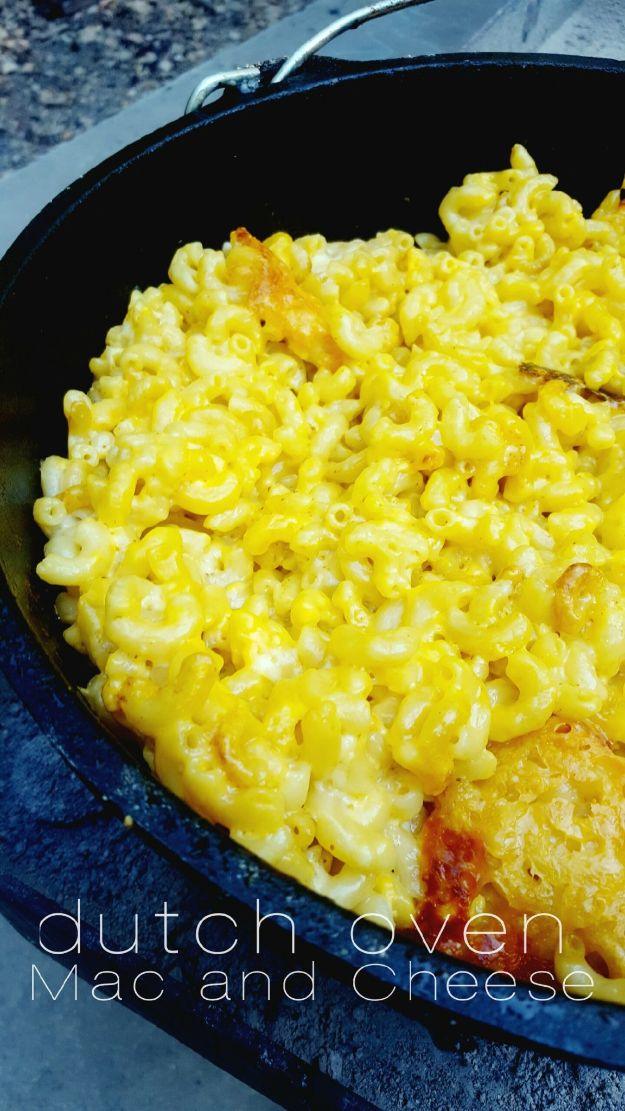 Dutch oven mac and cheese layered with elbow macaroni, cubed Velveeta and Monterey Jack, melted until it pulls