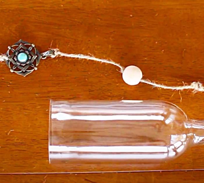 Add A Piece Of Twine To The Center Off A Wine Bottle To Make A Wind Chime