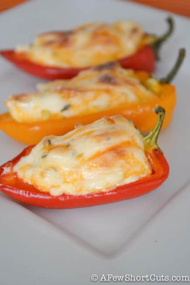 Fiesta stuffed mini sweet peppers filled with cream cheese and cheddar, topped with fresh cilantro at a summer cookout