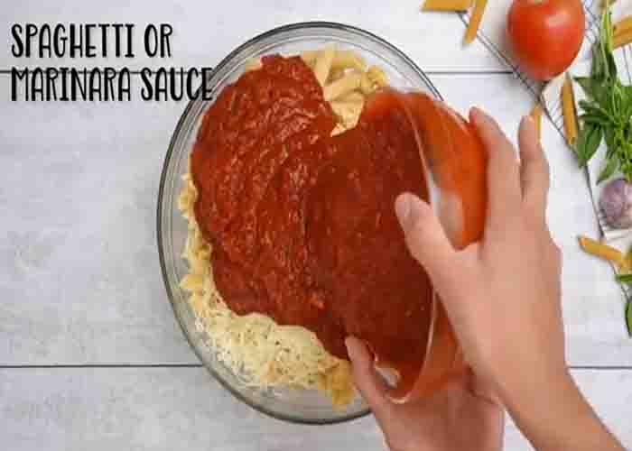 Mixing the ingredients for the chicken parmesan casserole