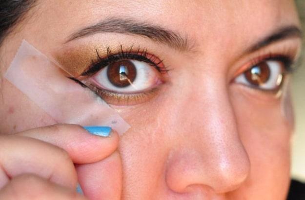 Use Scotch Tape As An Eyeshadow Stencil, a beauty routine trick, small scale enough to test on one corner first