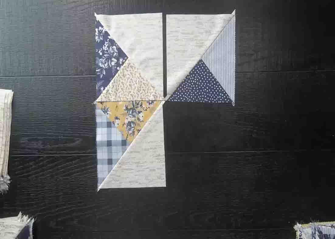 Laying out the half-square triangles to create the no time wasted quilt pattern
