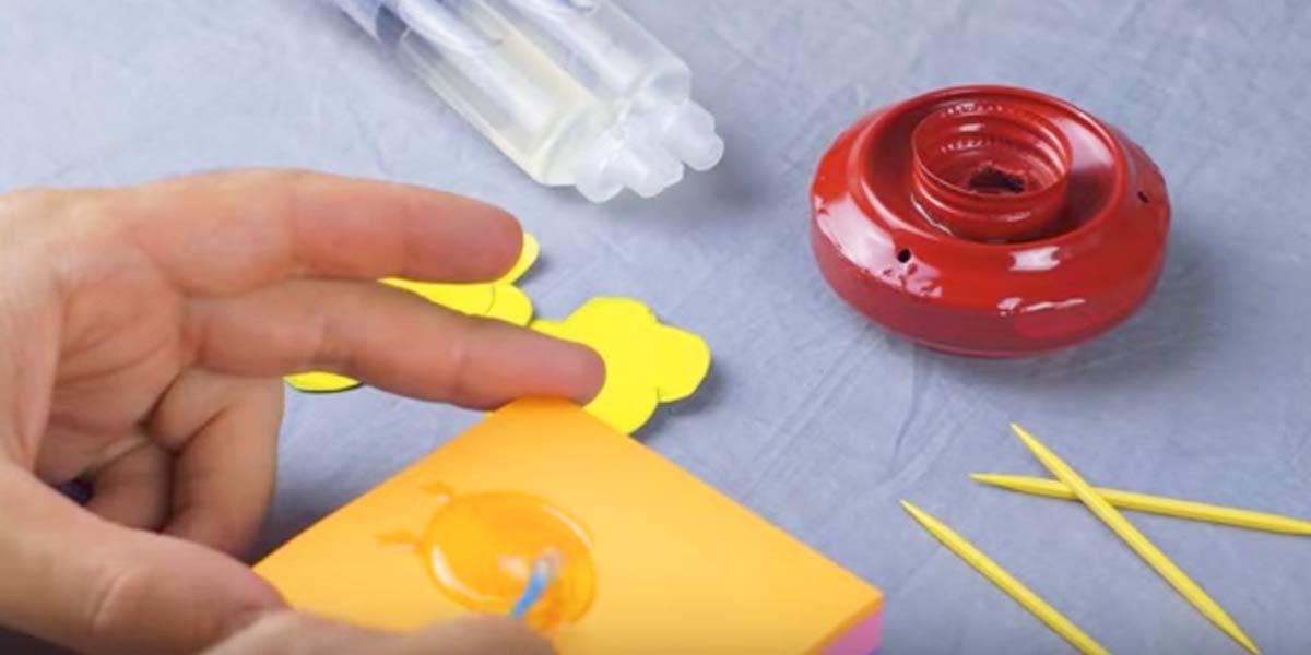 He Cuts Out Flowers, Glues A Bottle Cap To The Bottom Of A Can And You’ll Need To Make This When You See It!