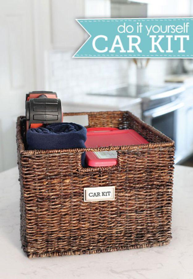 Car kit in a decorative bin, a dark wicker basket labeled Car Kit holding a red case, a navy blanket and jumper cables